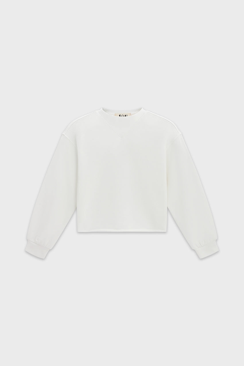 #color_off white - Front view of white mock neck cropped kids sweatshirt — made from soft organic cotton